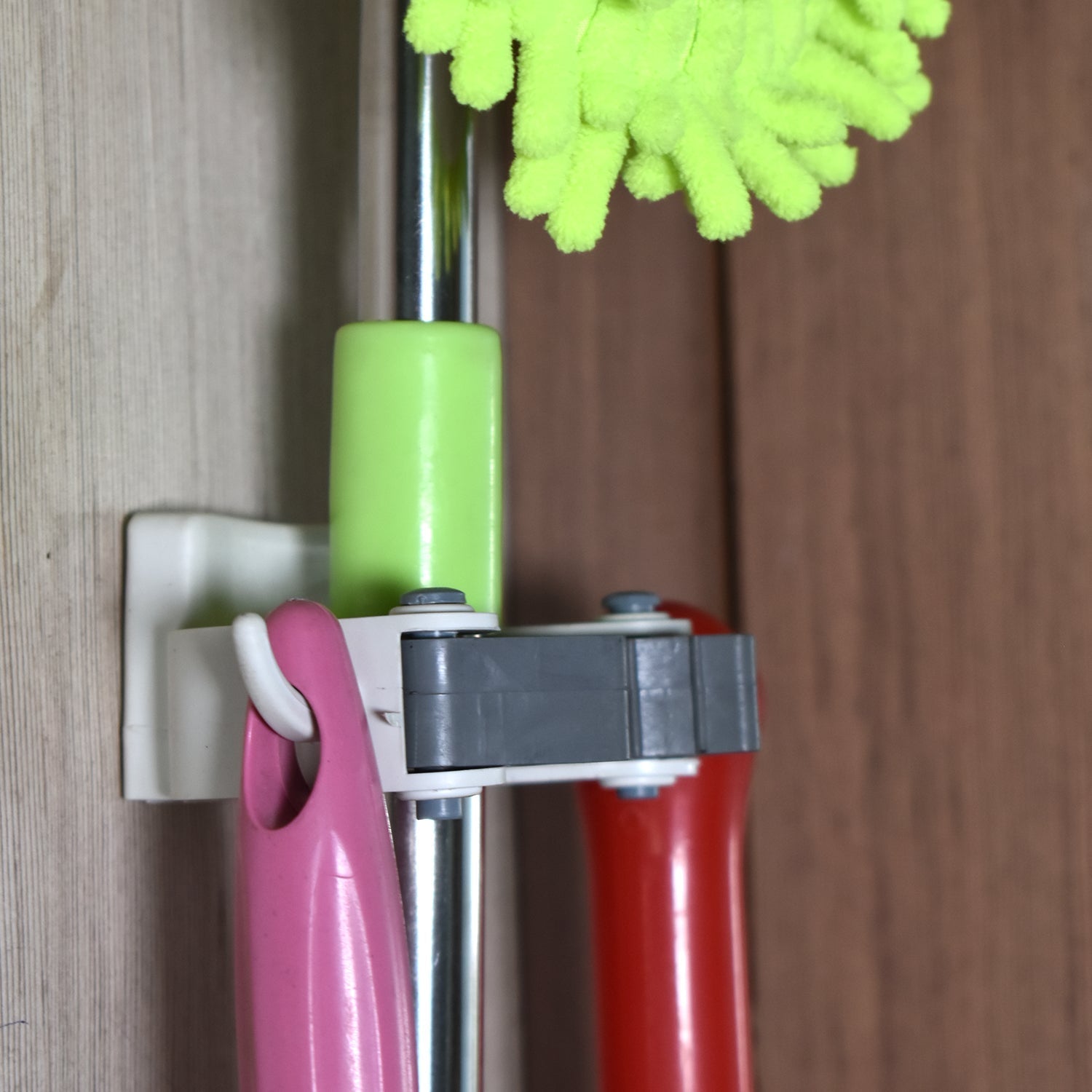 Invisible Mop Hanger used in all kinds of place like houses, offices, general stores for holding and hanging various mops and stuffs easily. thumbnail 6